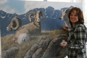 Artist Valerie Rogers painting Big Horn Sheep